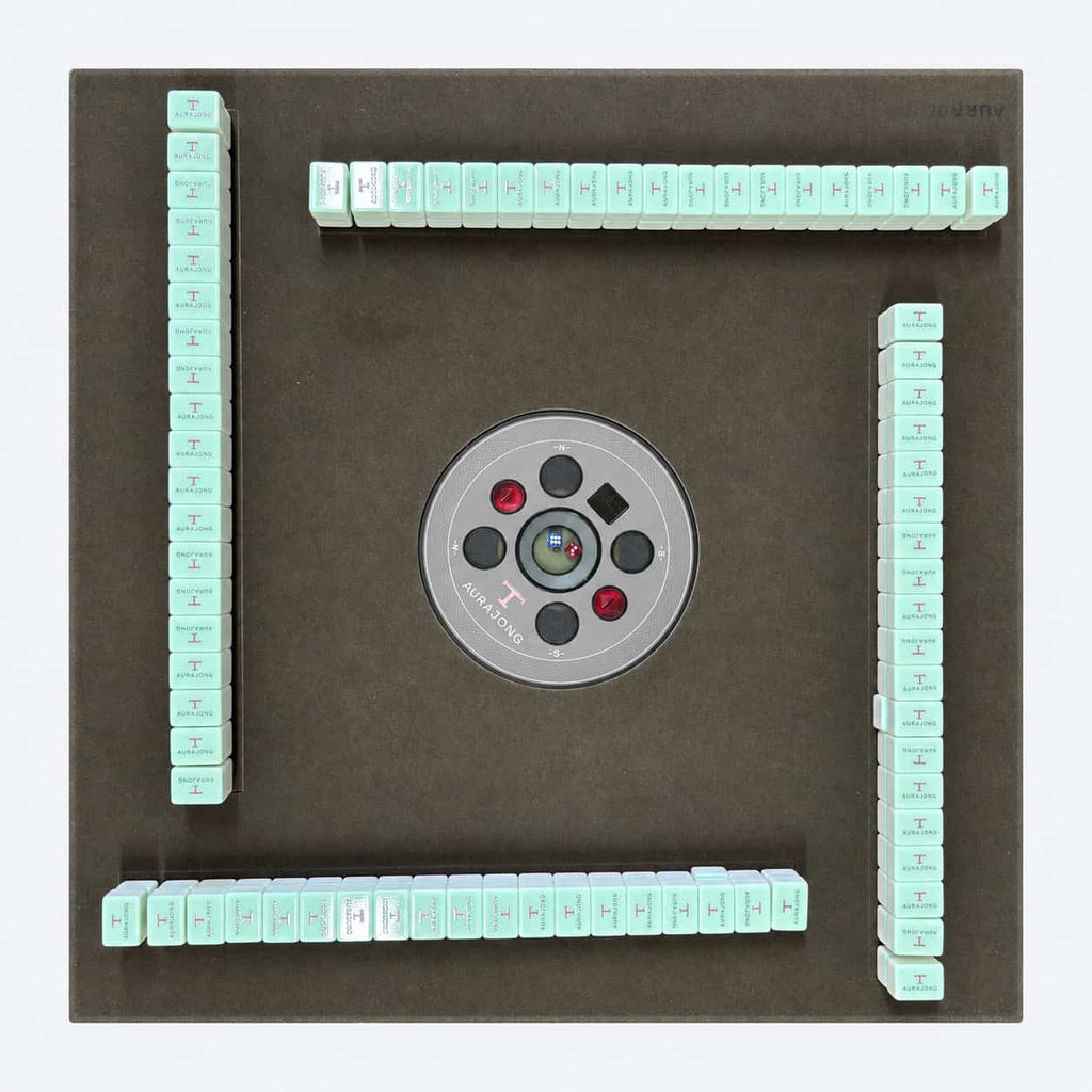 Top view of the AURAJONG R1 automatic American Mahjong table with mint green American Mahjong tiles