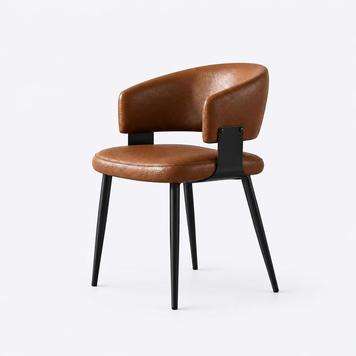 AURAJONG R4 cognac upholstered Mahjong chair with curved backrest and slim black legs.