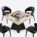 AURAJONG R4 ivory and black automatic American Mahjong table set up with tiles, racks, NMJL cards, and four chairs.