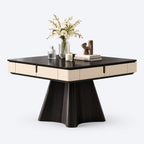 AURAJONG R4 ivory and black automatic American Mahjong table with dining cover, sculptural pedestal base, and styled tabletop decor.