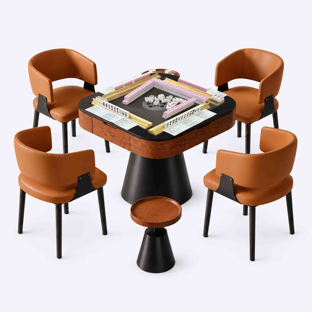 AURAJONG R5 automatic American Mahjong table fully set up for play with mahjong tiles, racks, NMJL cards, four cognac chairs, and a matching side table.