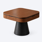 AURAJONG R5 automatic American Mahjong table in closed dining mode with a walnut-tone top, rounded corners, integrated drawers, and a black pedestal base.
