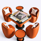 AURAJONG S1 automatic American Mahjong table shown with tiles, racks, NMJL cards, four orange faux leather chairs, and side tables.
