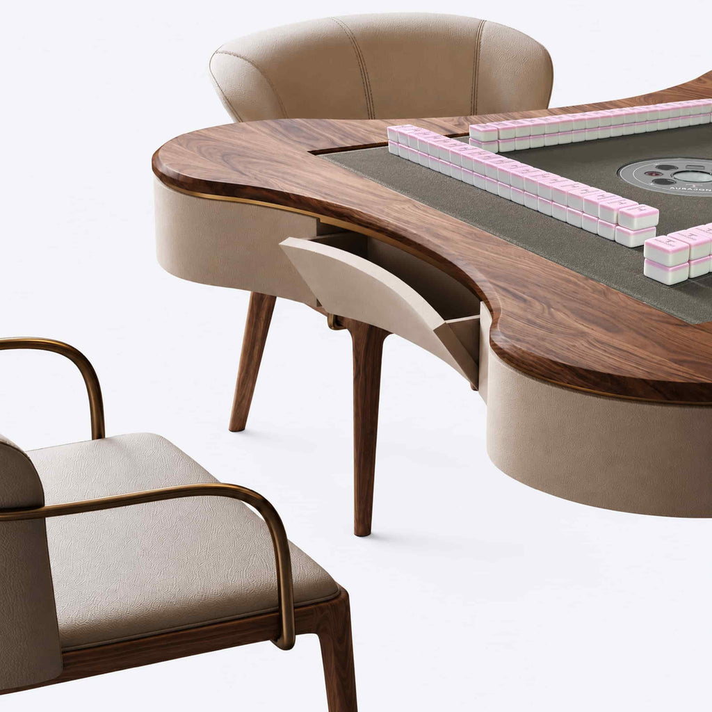 Close-up of the AURAJONG S2 hidden drawer, black walnut tabletop edge, cream white top-grain leather body, and American Mahjong tiles.