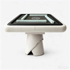 Front view of the AURAJONG S4 automatic American Mahjong table in ivory with grey play surface and American Mahjong tiles.