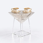 AURAJONG T1 clear acrylic side table with sculptural textured panels, styled with two coffee cups