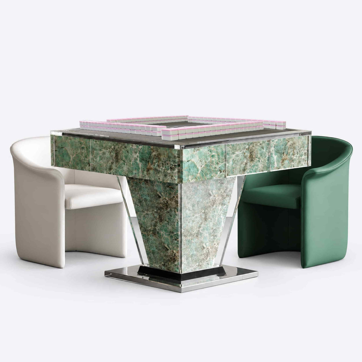 AURAJONG T1 luxury automatic American Mahjong table in green sintered stone and clear acrylic shown with pink Mahjong tiles and upholstered chairs