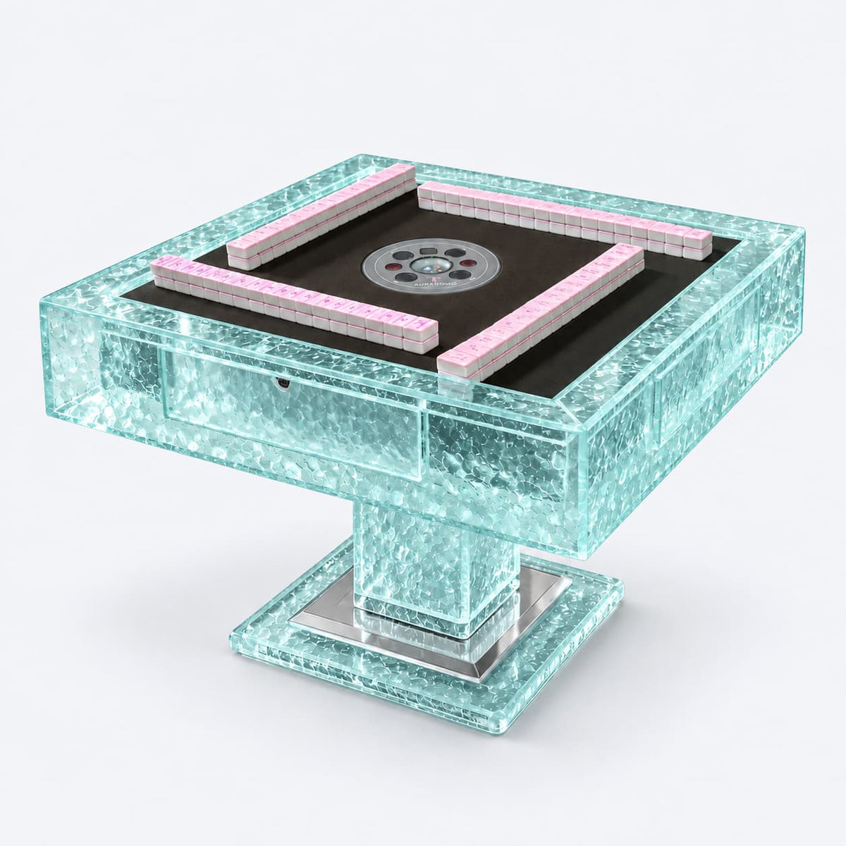 AURAJONG T2 automatic American Mahjong table crafted from translucent aqua acrylic with a dark playing surface and pink Mahjong tiles