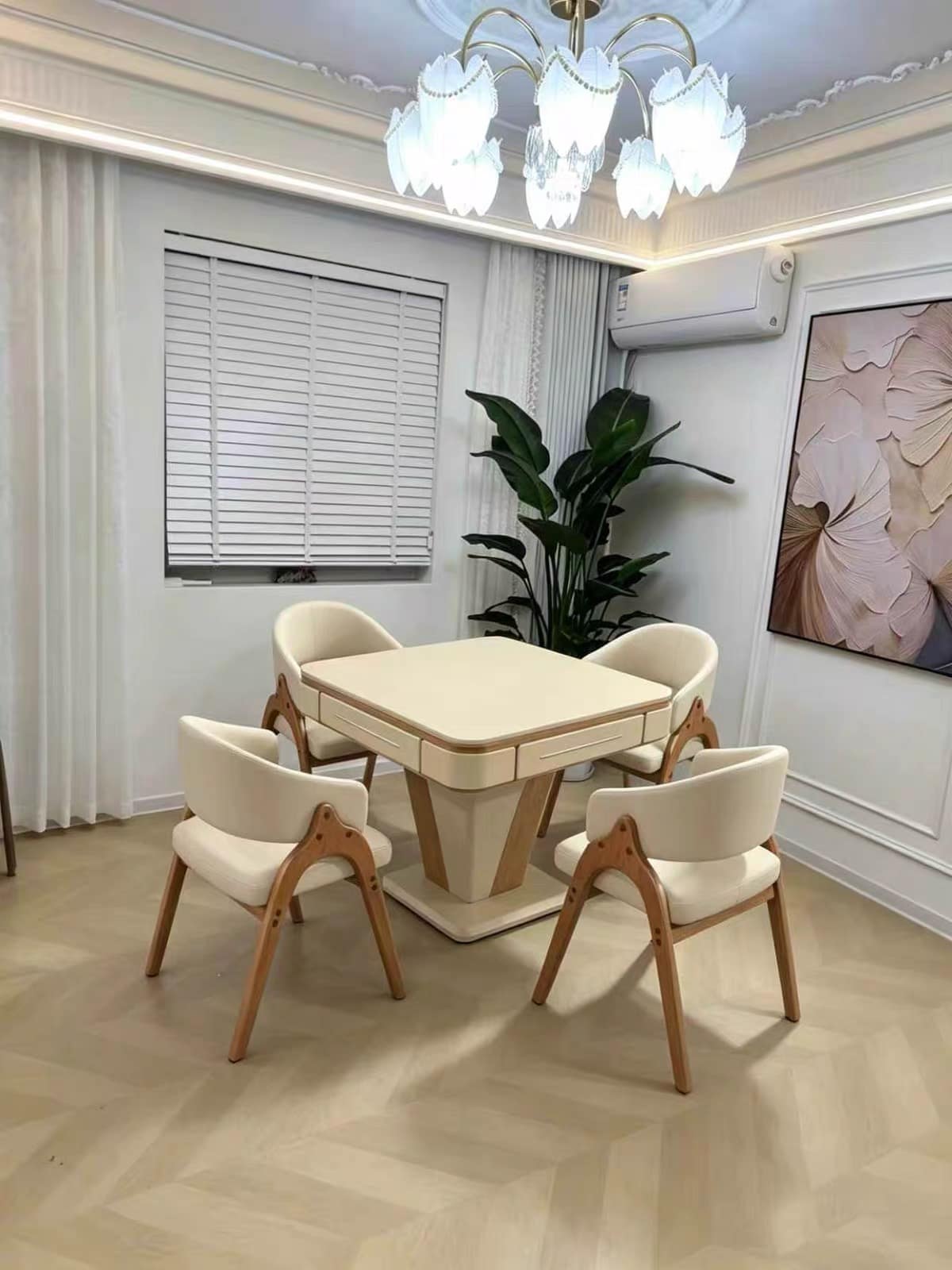 AURAJONG R2 automatic American Mahjong table in an elegant home interior with four upholstered chairs and a cream finish
