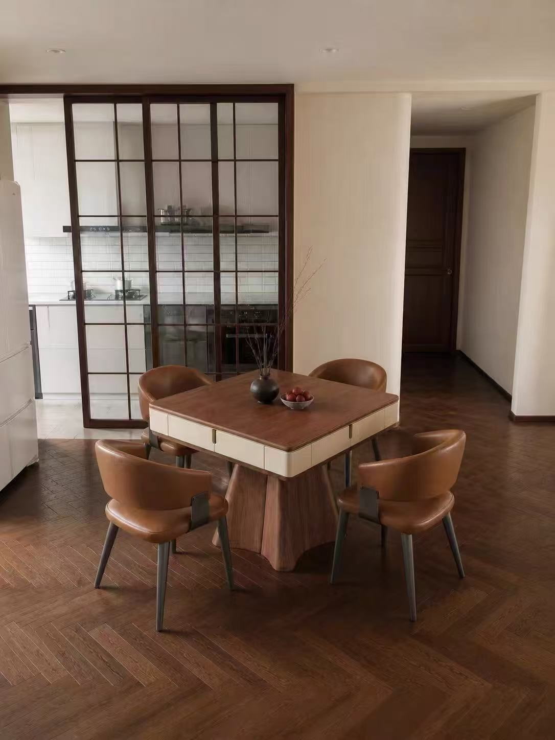 AURAJONG R4 automatic American Mahjong table with walnut and ivory finish in a modern dining area with four brown leather chairs