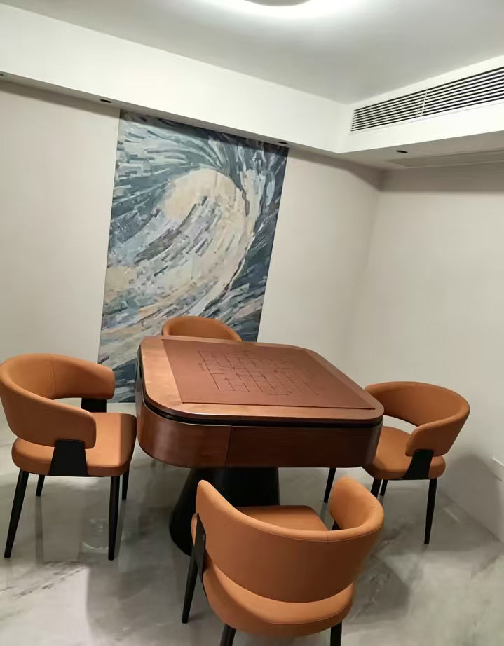 AURAJONG R5 automatic American Mahjong table with Mahjong play surface and four brown upholstered chairs in a modern home